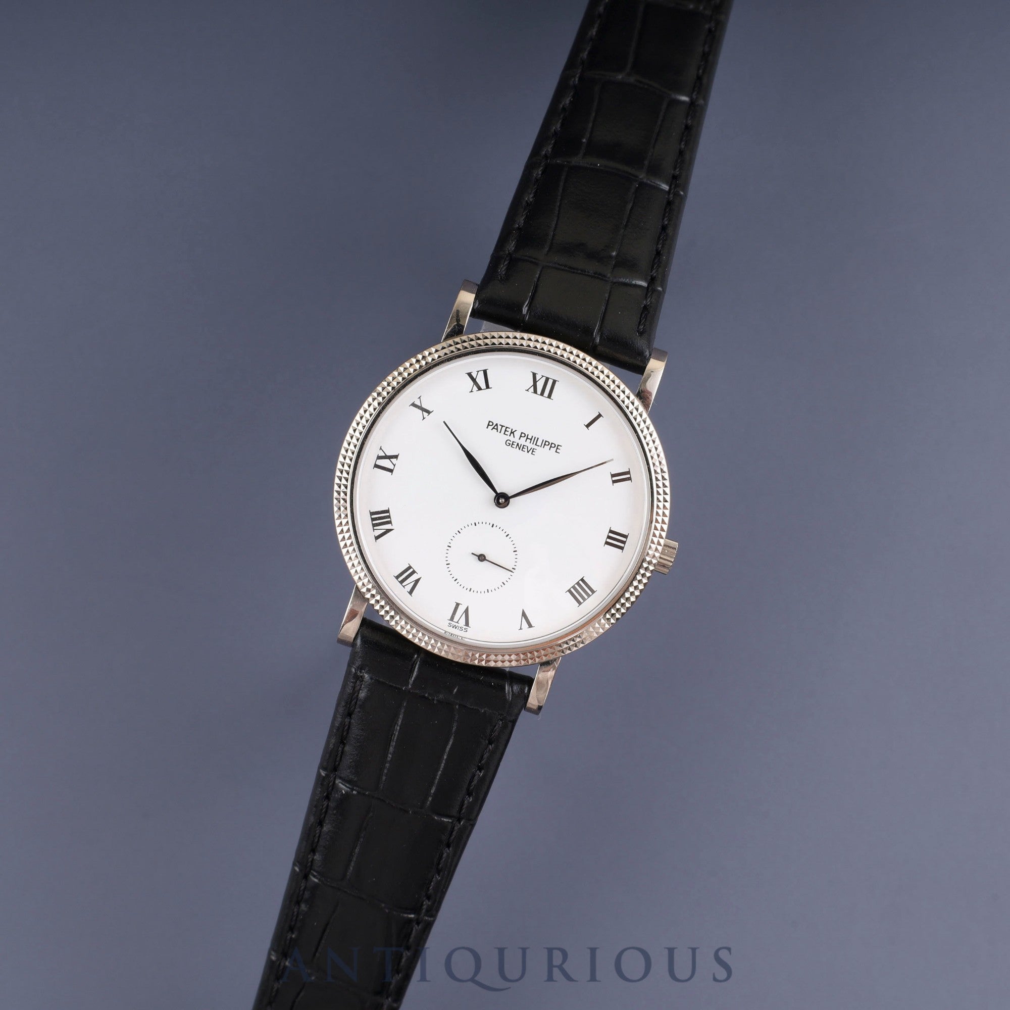 パテック・フィリップ カラトラバ 3919G-001 手巻き Cal.215 750 革 純正尾錠(750) ホワイトローマン文字盤 箱 ケース(劣化) アーカイヴ(2017年発行/1992年購入品)修理明細(個人名記載あり)純正ベルト付き(使用感あり) オーバーホール済み