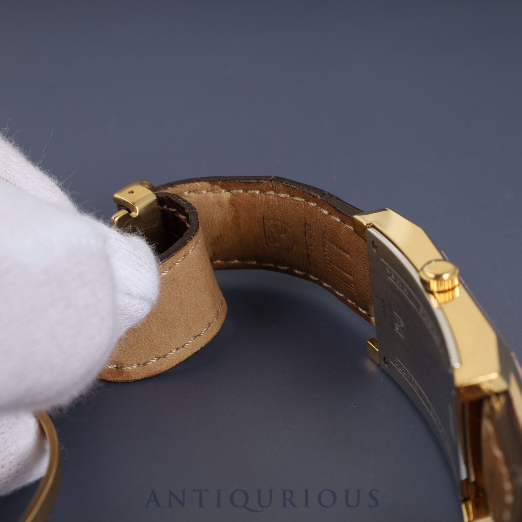 Dunhill Dunhillion Quartz GP with genuine leather strap and genuine D-buckle (GP), white dial, box and booklet, overhauled.