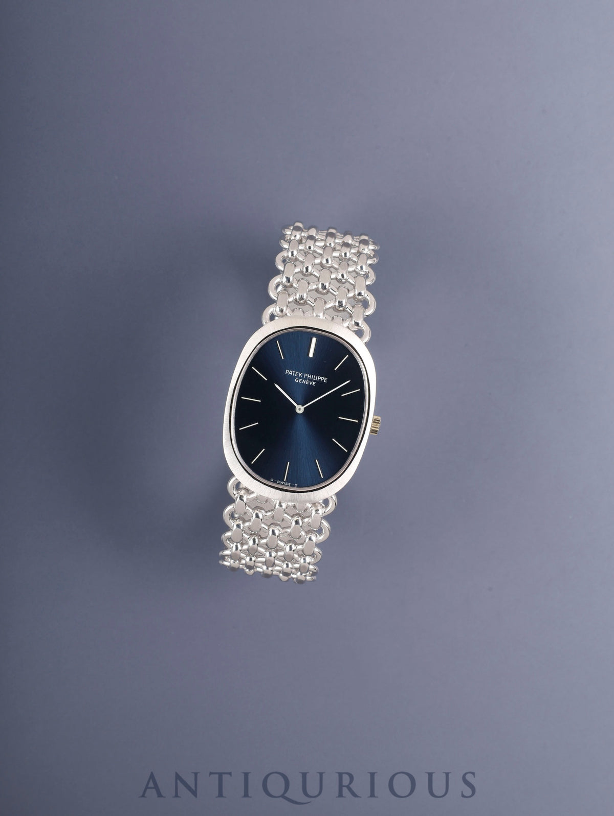 パテック・フィリップ ゴールデンエリプス 3577/1 手巻き Cal.175 750WG 750WG ブルー文字盤(σ・SWISS・σ表記)保証書ケース 冊子 保証書(1976年) 修理保証書(1988年) 原産地証明書兼保証書 オーバーホール済み