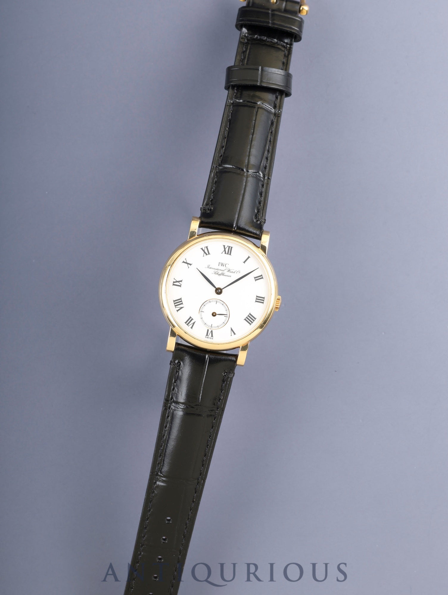 IWC ポートフィノ 2533-001 手巻き Cal.C.4231 750YG 革 純正ピンバックル(GP)ホワイトローマン文字盤 オーバーホール済み アイダブリュシー