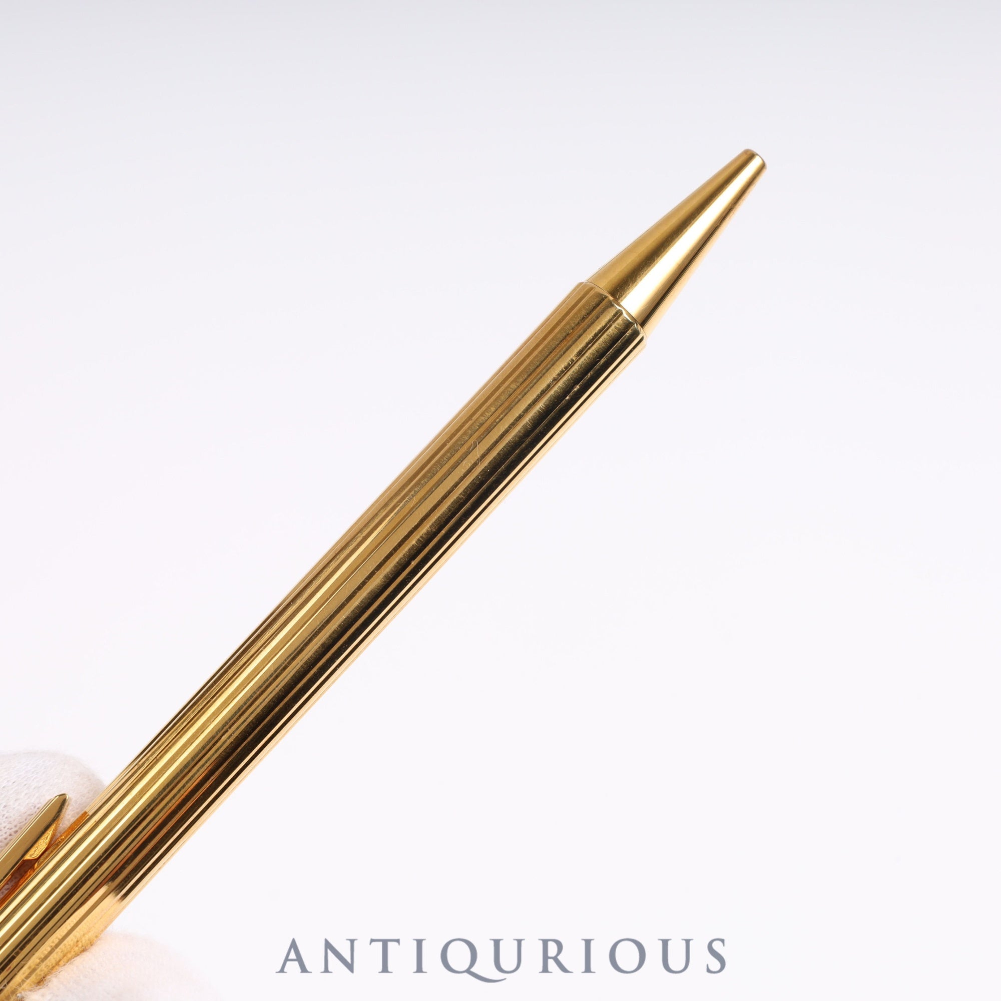 Cartier Trinity ballpoint pen. Replaced with an unused refill at Cartier.