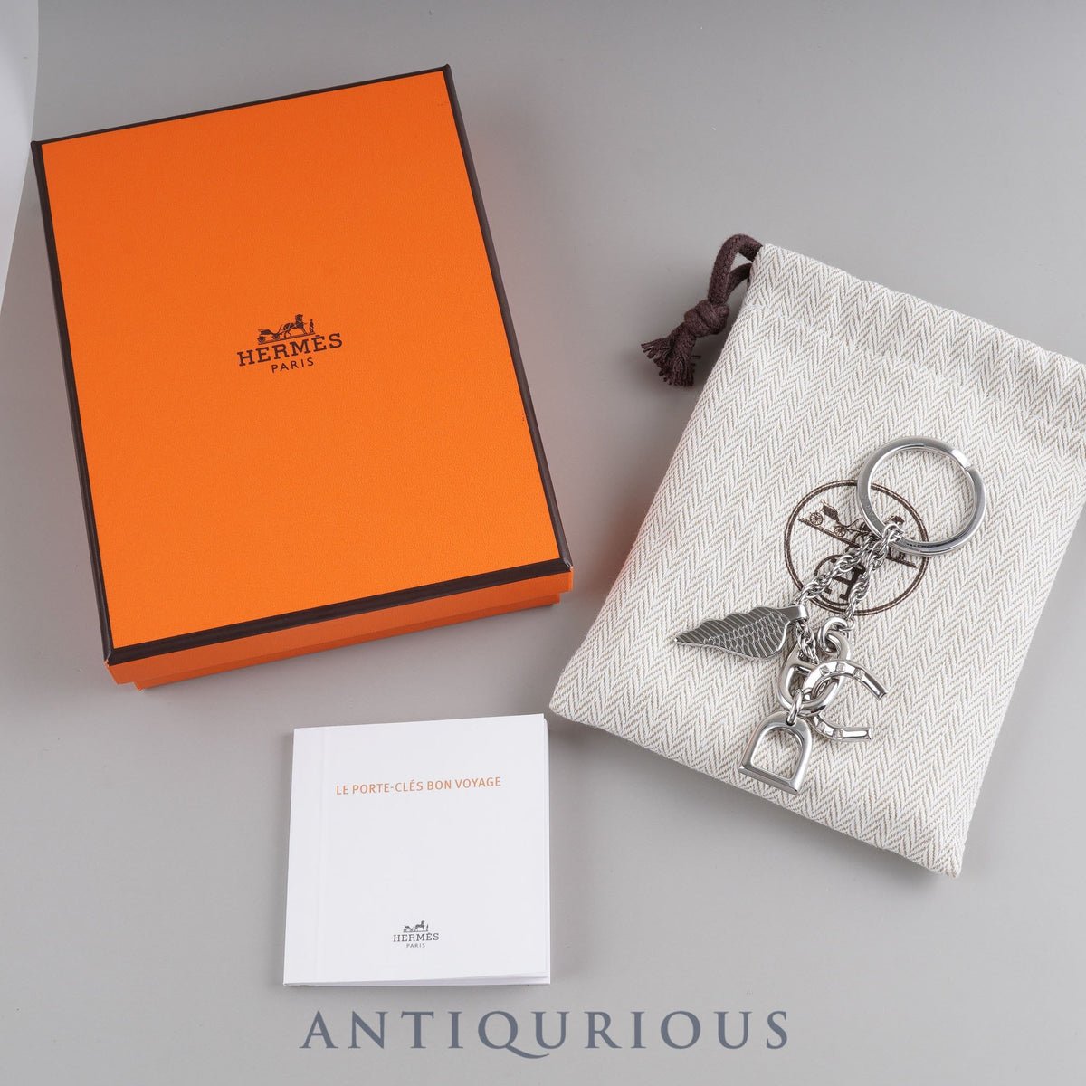 Hermès Bon Voyage keychain, stainless steel, box, dust bag, booklet, tag