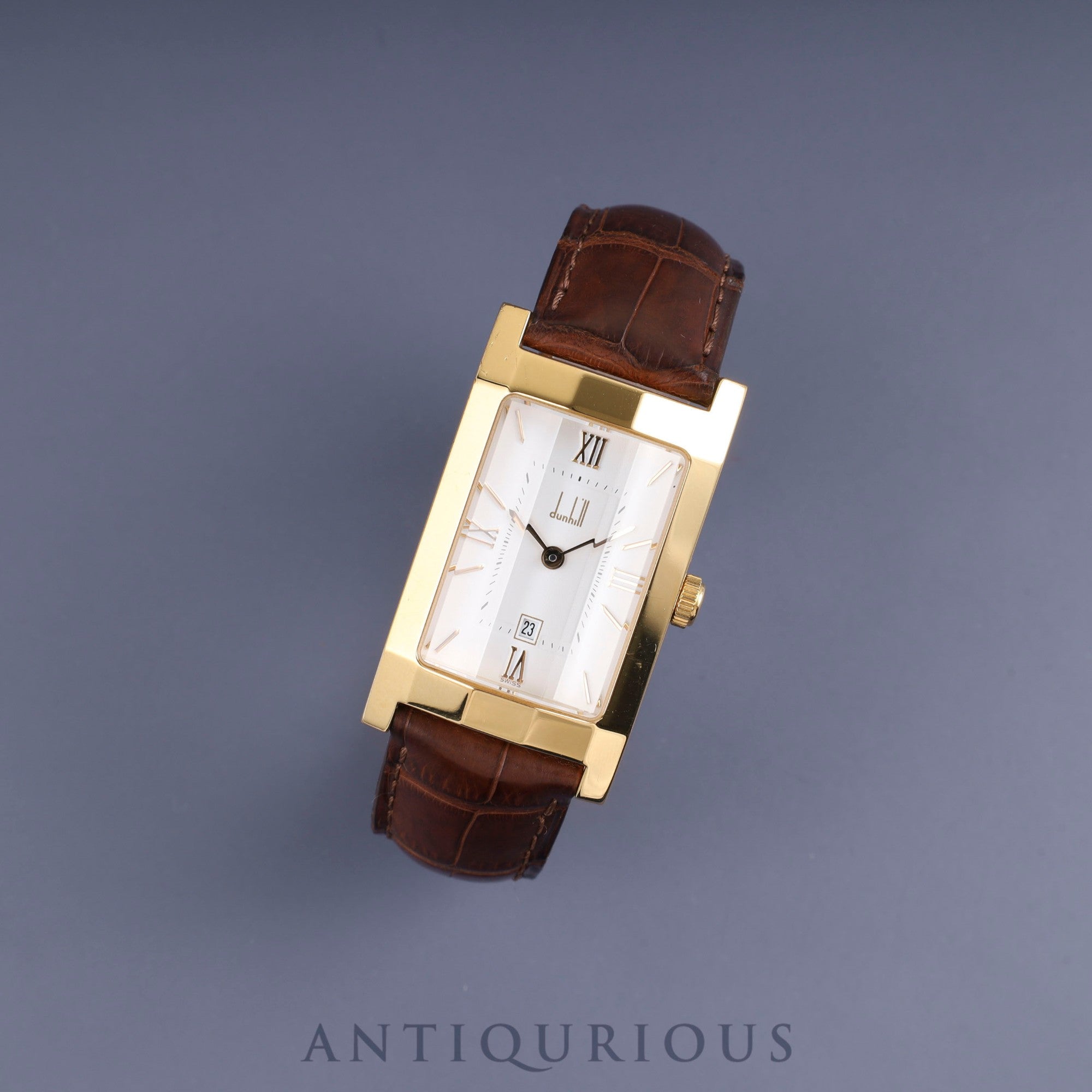 Dunhill Dunhillion Quartz GP with genuine leather strap and genuine D-buckle (GP), white dial, box and booklet, overhauled.