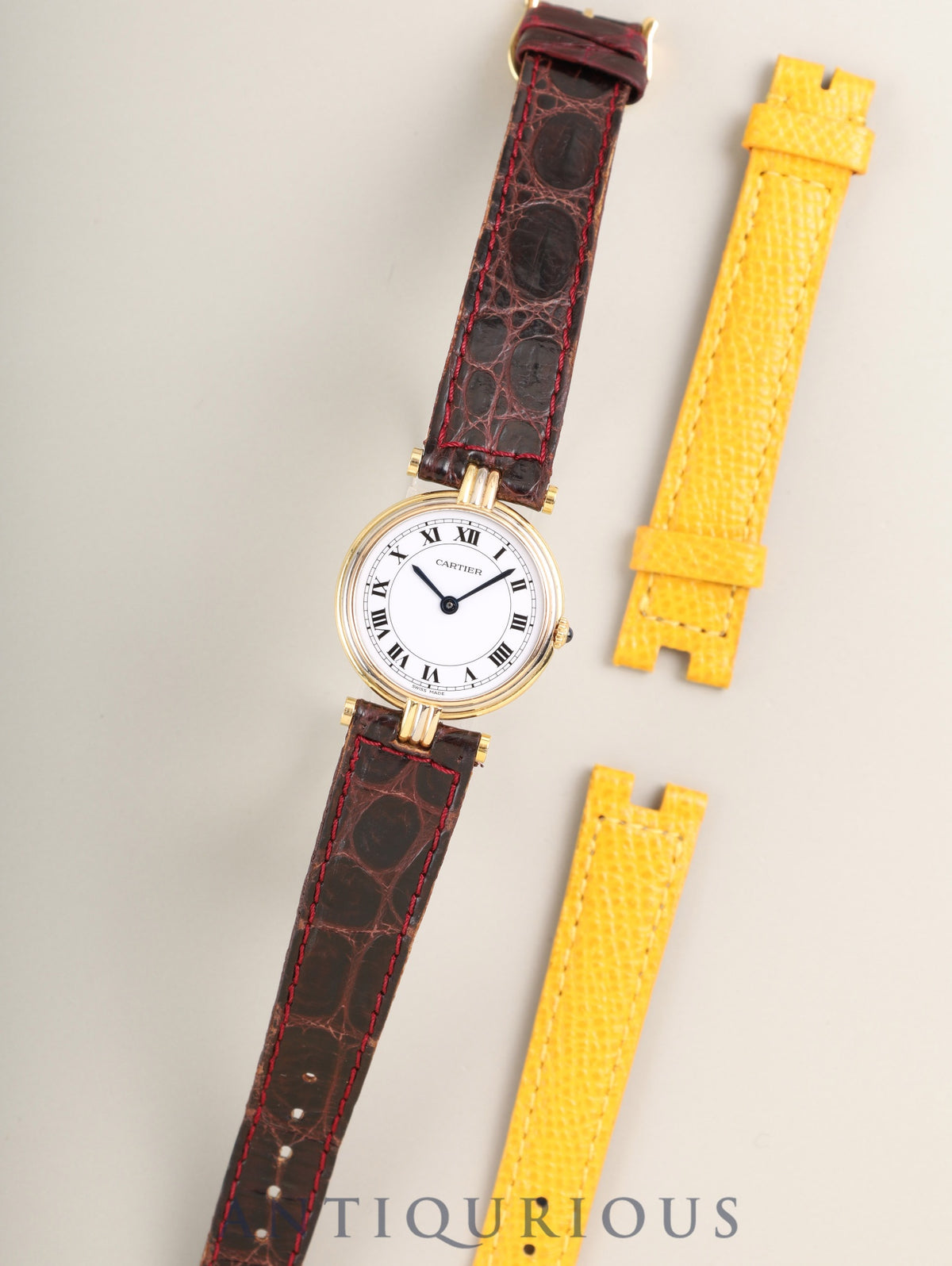 Cartier Vendôme Trinity VLC SM 81004 Quartz Caliber 690 750 with genuine leather strap and genuine buckle (GP). White Roman dial with genuine strap. (Unused) Overhauled.