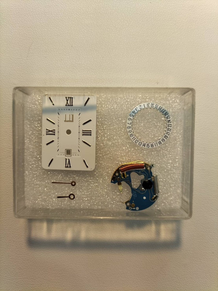 Dunhill Dunhillion Quartz GP with genuine leather strap and genuine D-buckle (GP), white dial, box and booklet, overhauled.