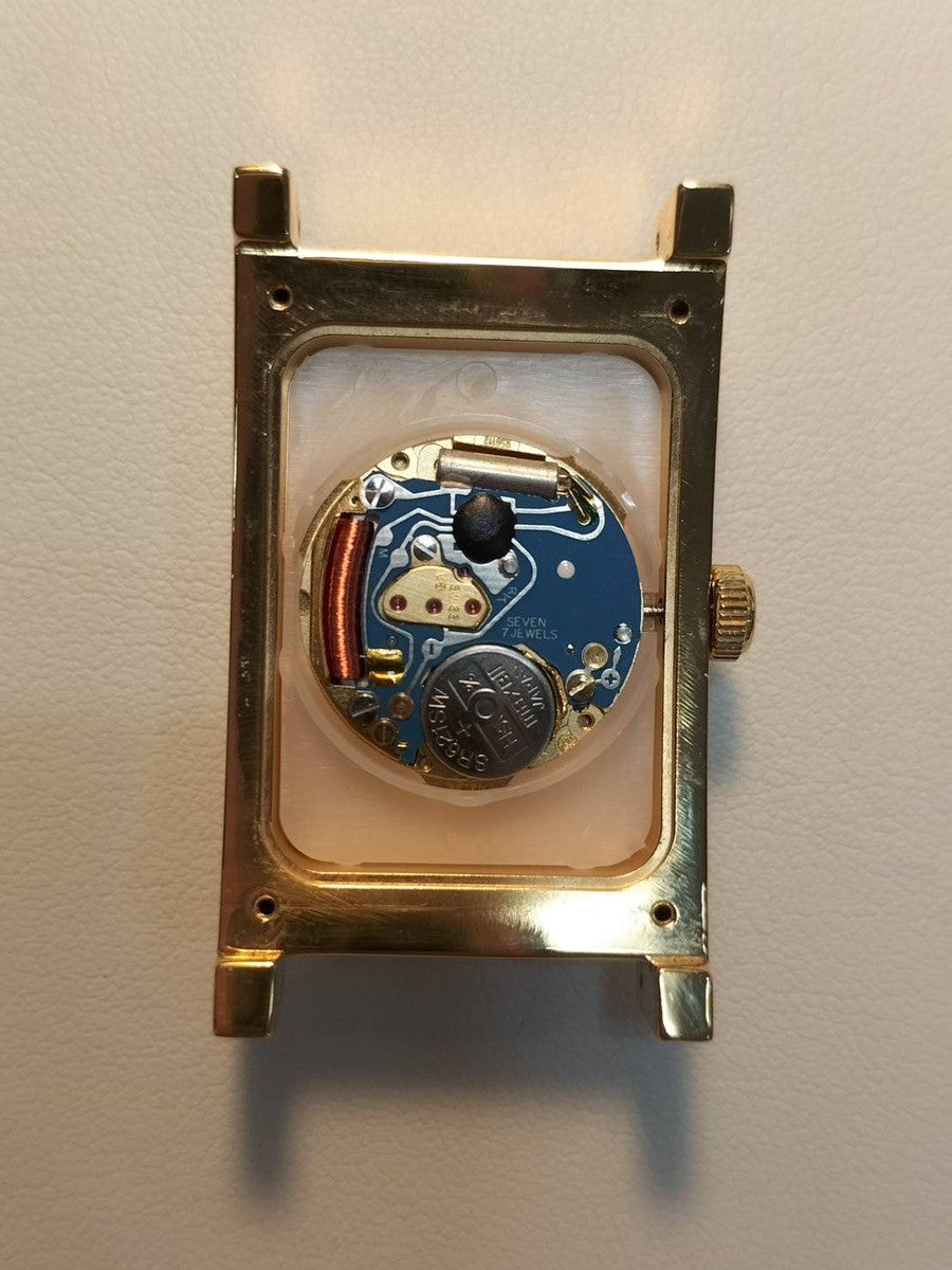 Dunhill Dunhillion Quartz GP with genuine leather strap and genuine D-buckle (GP), white dial, box and booklet, overhauled.