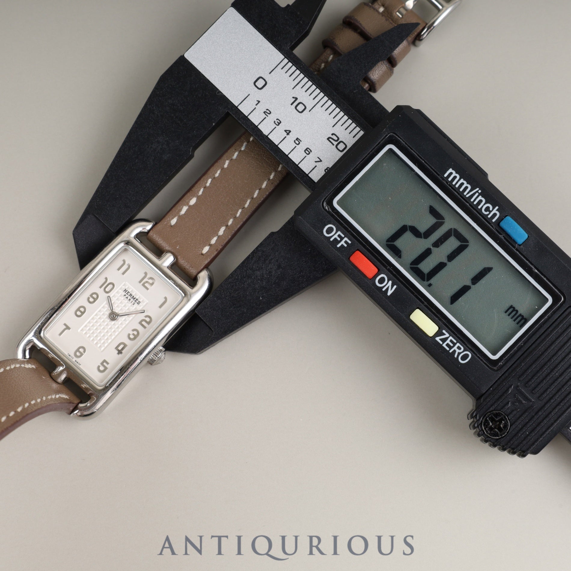 Hermès Nantucket NA2.210 Quartz Cal.280.002 Stainless Steel Watch with Genuine Leather Strap (R Stamp: 2014) and Genuine Stainless Steel Buckle. Silver Dial. Overhauled.