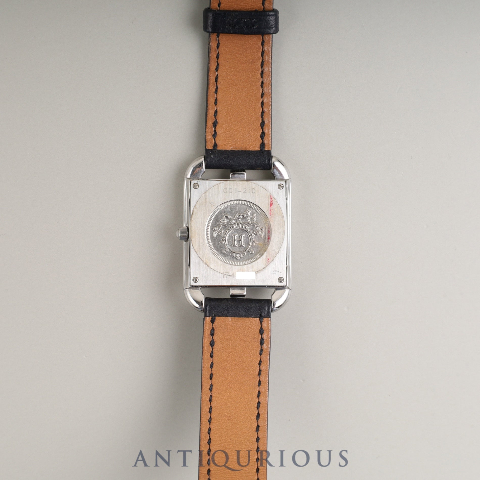 Hermès Cape Cod CC1.210 Quartz Caliber 976.001 Stainless Steel Watch with Genuine Leather Strap (E Stamp: 2001) and Genuine Stainless Steel Buckle. Gray Arabic Dial. Overhauled.
