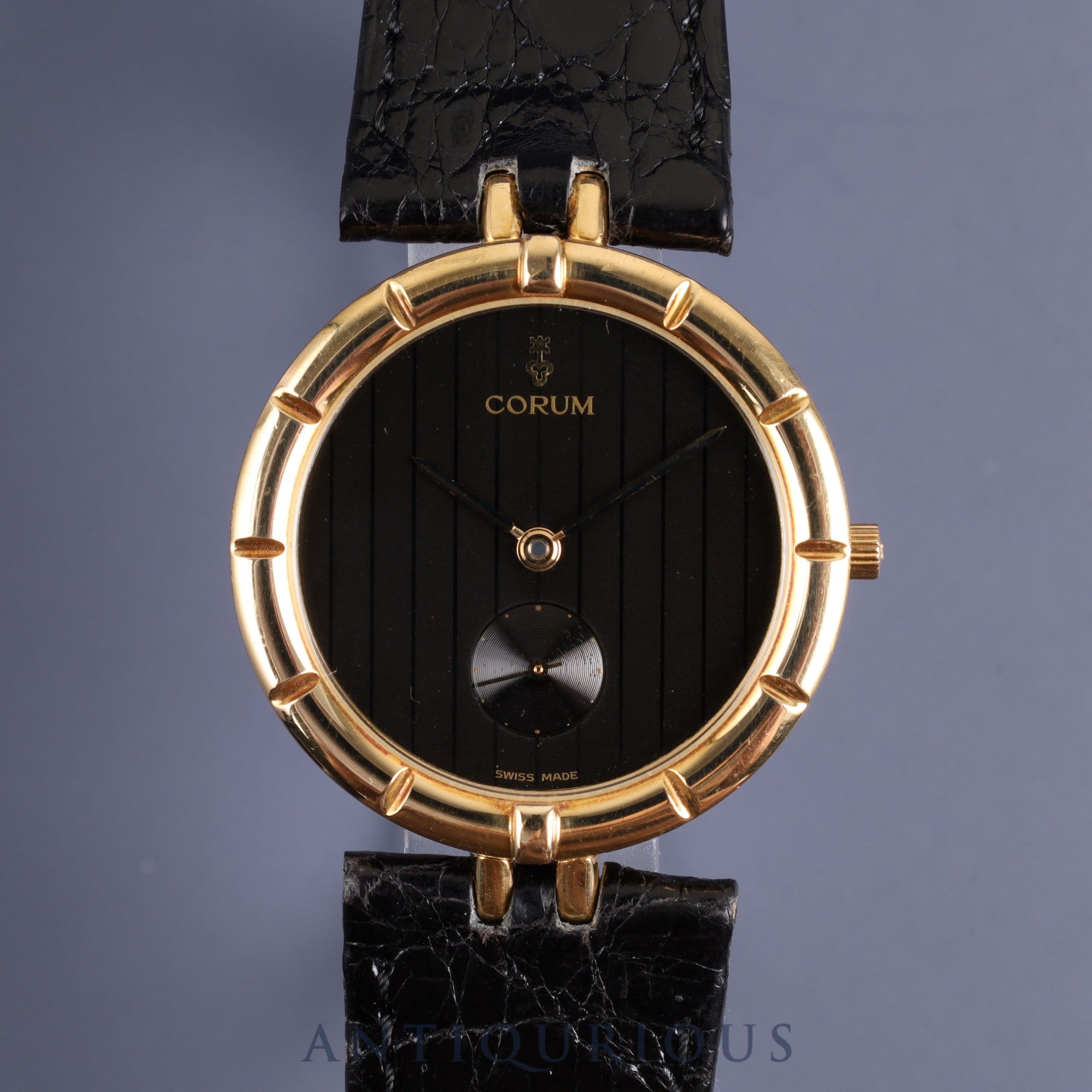 Corum Round 94.129.56 Quartz Cal.211 101 18KYG Leather Genuine Buckle (GP) Black Dial Box Warranty (1991) Overhauled
