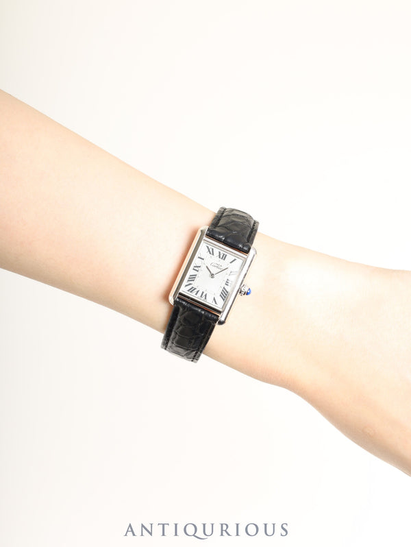 Cartier Must Tank MM W1016530 / 2416 Quartz Caliber 057 SV925 with genuine leather strap and genuine D-buckle (SS). Silver Roman dial (SWISS MADE / Christmas limited edition). Circa 2000. Includes booklet and warranty card. Overhauled.