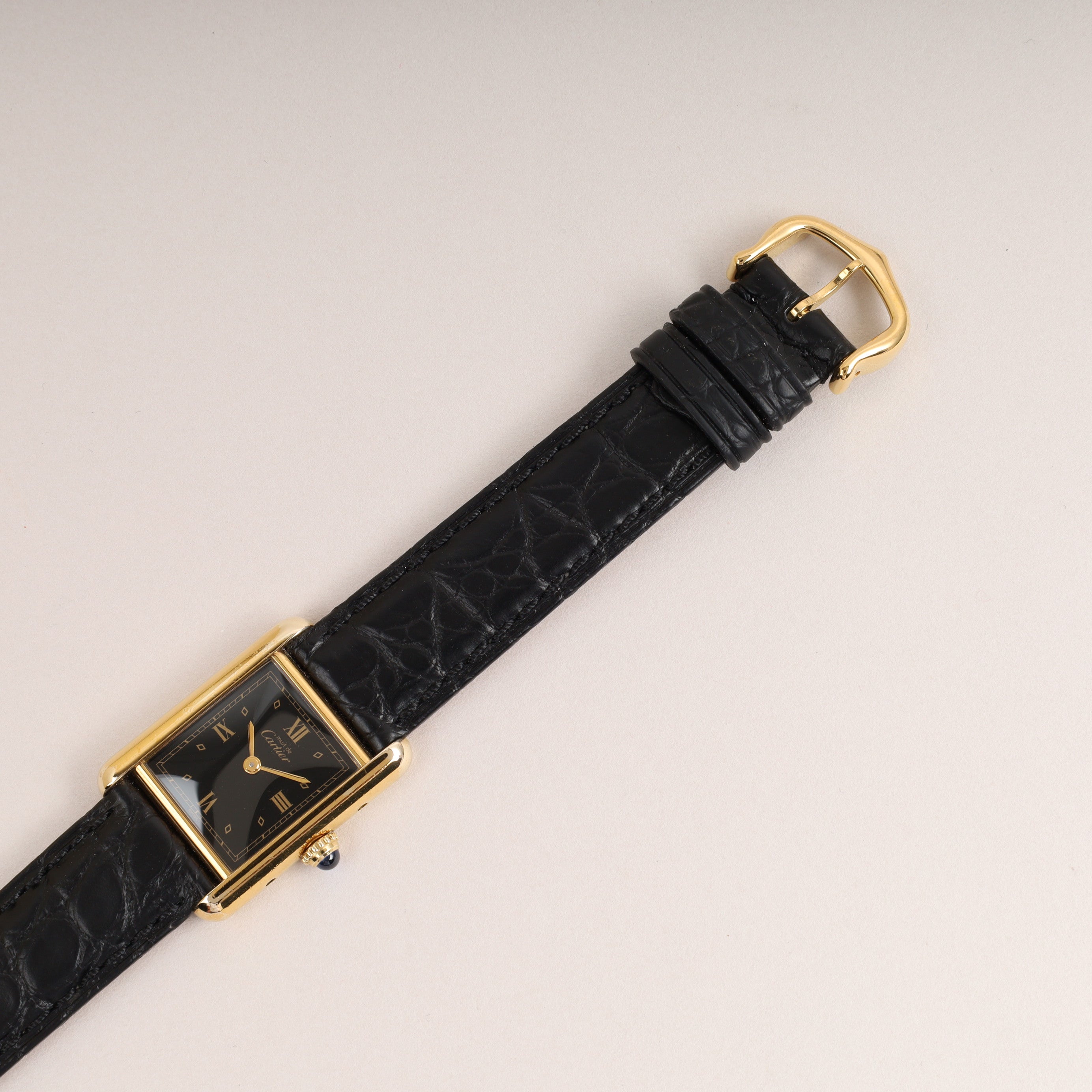 カルティエ マストタンク SM QZ ブラック飛びローマン文字盤