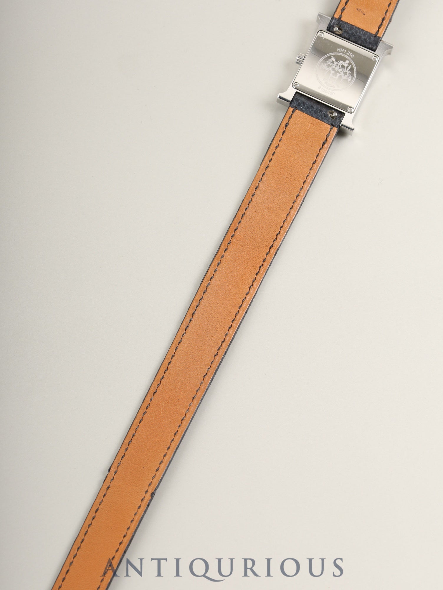 Hermès H Watch Double Tour HH1.210 Quartz Caliber 901.001 Stainless Steel with Genuine Leather Strap (T Stamp: 2015) and Genuine Buckle (SS). White Dial. Includes Box, Warranty Card, and Booklet. Overhauled.