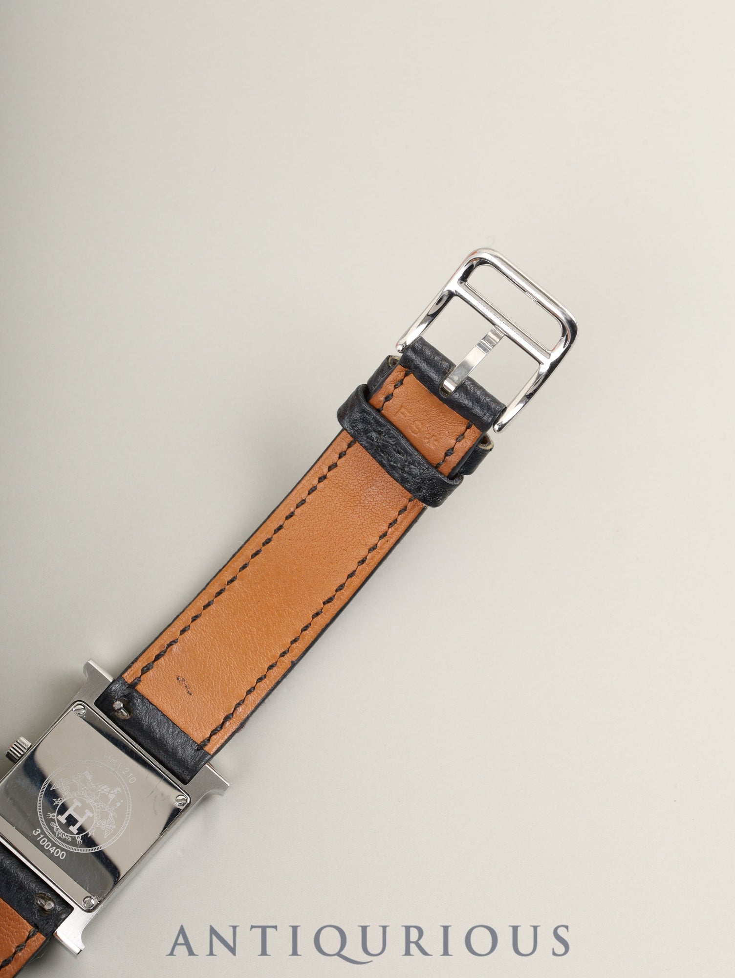 Hermès H Watch Double Tour HH1.210 Quartz Caliber 901.001 Stainless Steel with Genuine Leather Strap (T Stamp: 2015) and Genuine Buckle (SS). White Dial. Includes Box, Warranty Card, and Booklet. Overhauled.