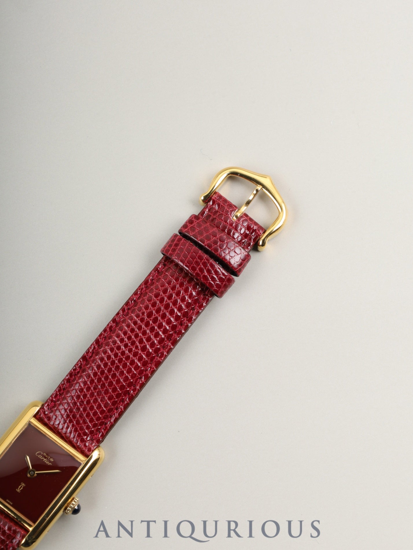 Cartier Must Tank SM, manual winding, SV925, leather, genuine buckle (GP), Bordeaux dial, garnet dial, box, booklet, international lifetime warranty (1984), fully serviced at a Cartier boutique
