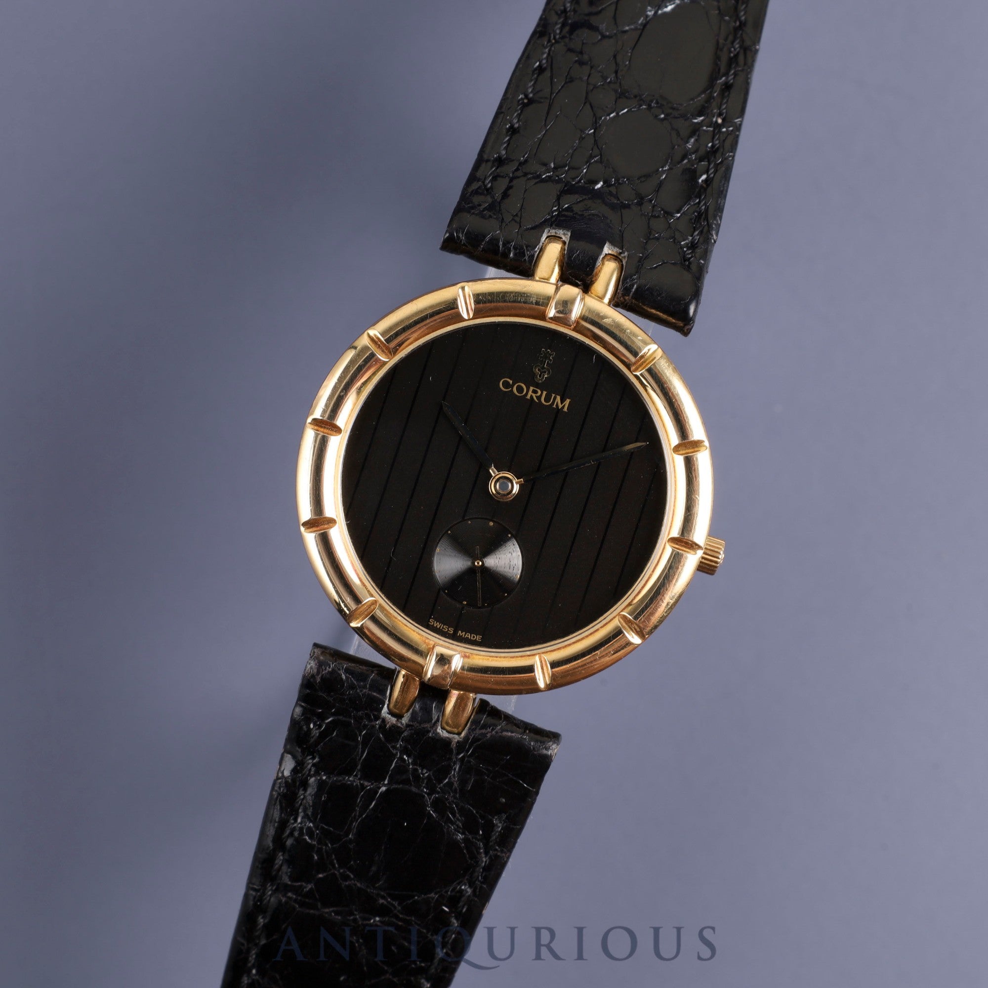 Corum Round 94.129.56 Quartz Cal.211 101 18KYG Leather Genuine Buckle (GP) Black Dial Box Warranty (1991) Overhauled