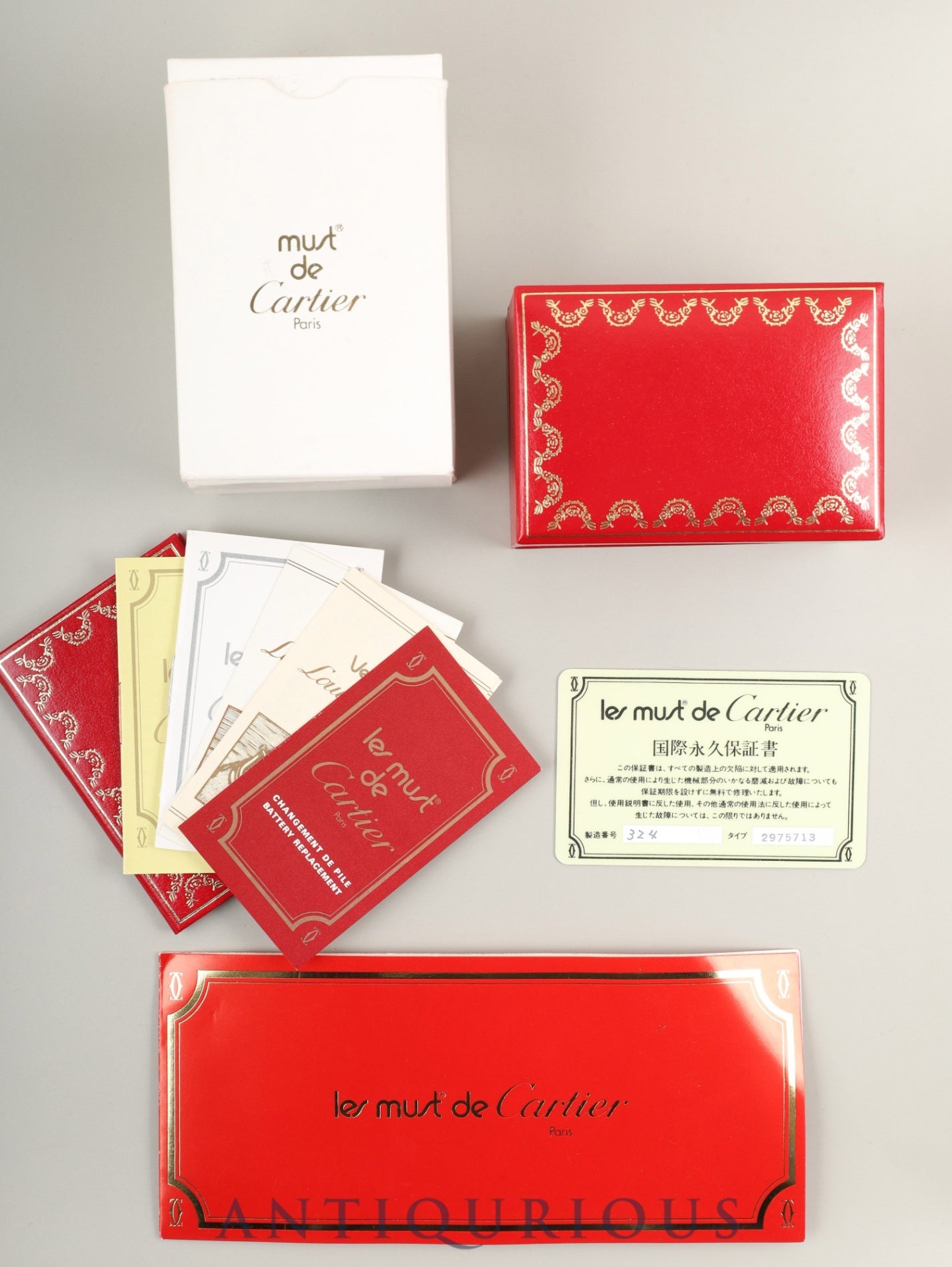 Cartier Must Tank SM, manual winding, SV925, leather, genuine buckle (GP), Bordeaux dial, garnet dial, box, booklet, international lifetime warranty (1984), fully serviced at a Cartier boutique