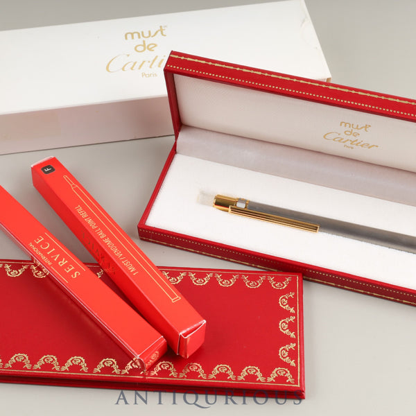 Cartier ballpoint pen Santos de twist type GP, box, warranty card (1994/personal name included), genuine replacement ink x 2 (black/blue)