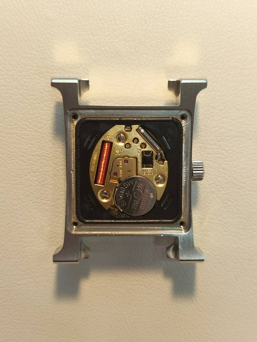 Hermès H Watch Double Tour HH1.210 Quartz Caliber 901.001 Stainless Steel with Genuine Leather Strap (T Stamp: 2015) and Genuine Buckle (SS). White Dial. Includes Box, Warranty Card, and Booklet. Overhauled.