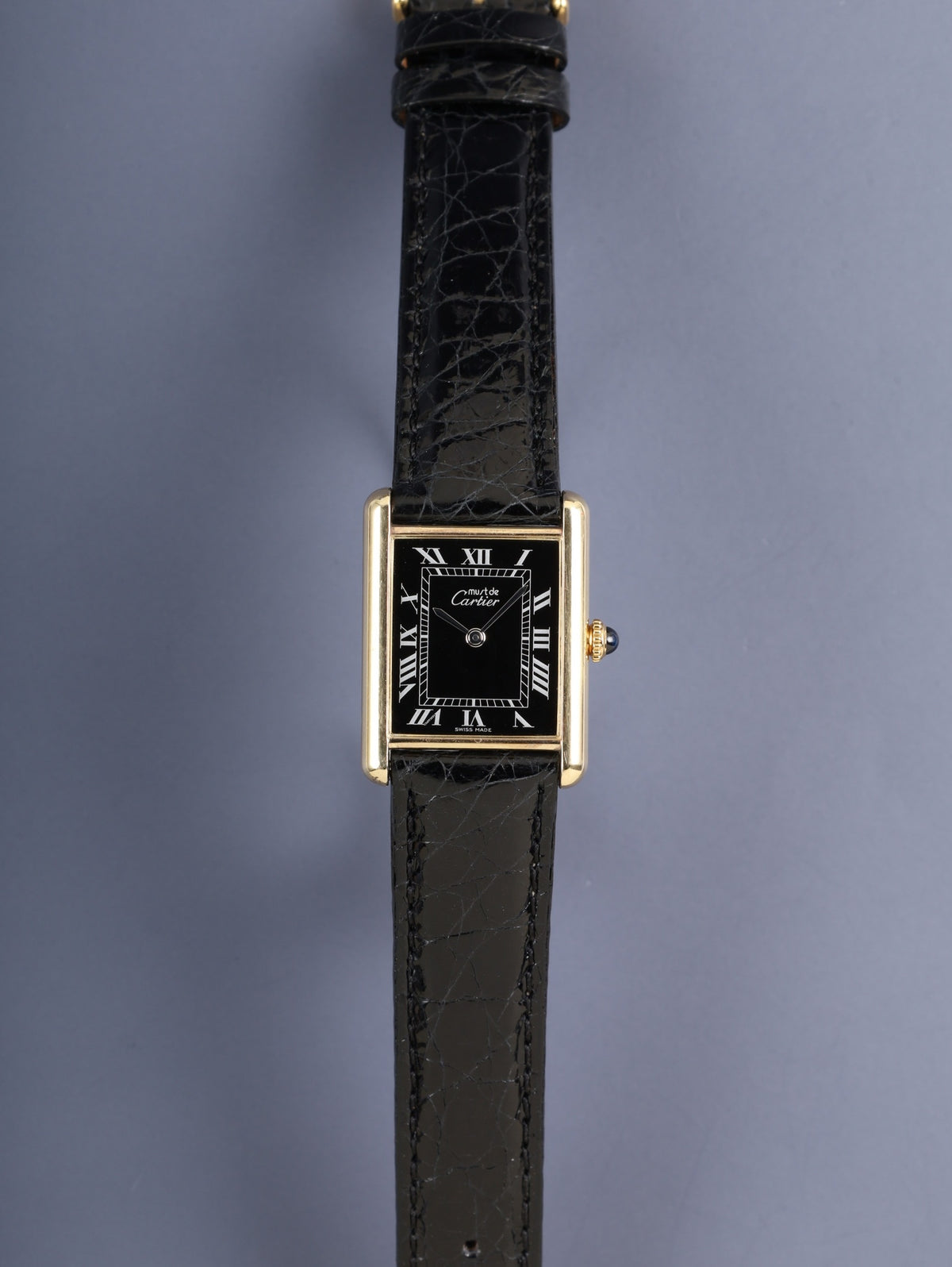 Cartier Must Tank LM, manual winding, Cal. 78-1, SV925, leather, genuine pin buckle (GP), black Roman dial (SWISS MADE inscription), fully serviced at a Cartier boutique.