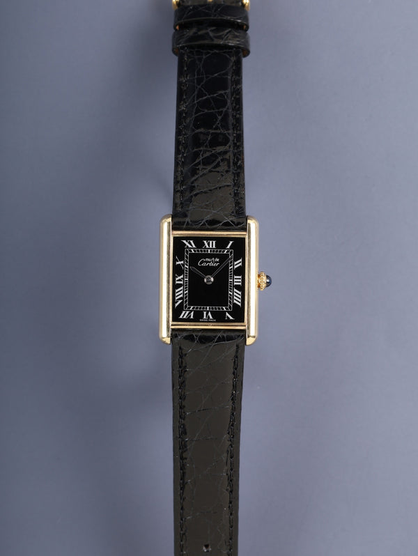 Cartier Must Tank LM, manual winding, Cal. 78-1, SV925, leather, genuine pin buckle (GP), black Roman dial (SWISS MADE inscription), fully serviced at a Cartier boutique.