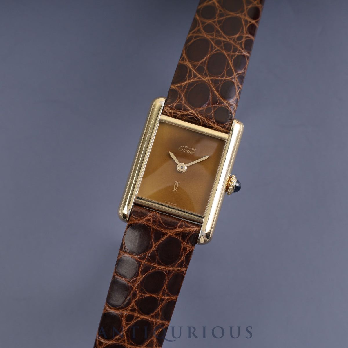 Cartier Must Tank SM, manual winding, SV925, original pin buckle (GP), mahogany dial (marked SWISS MADE), fully serviced at a Cartier boutique.