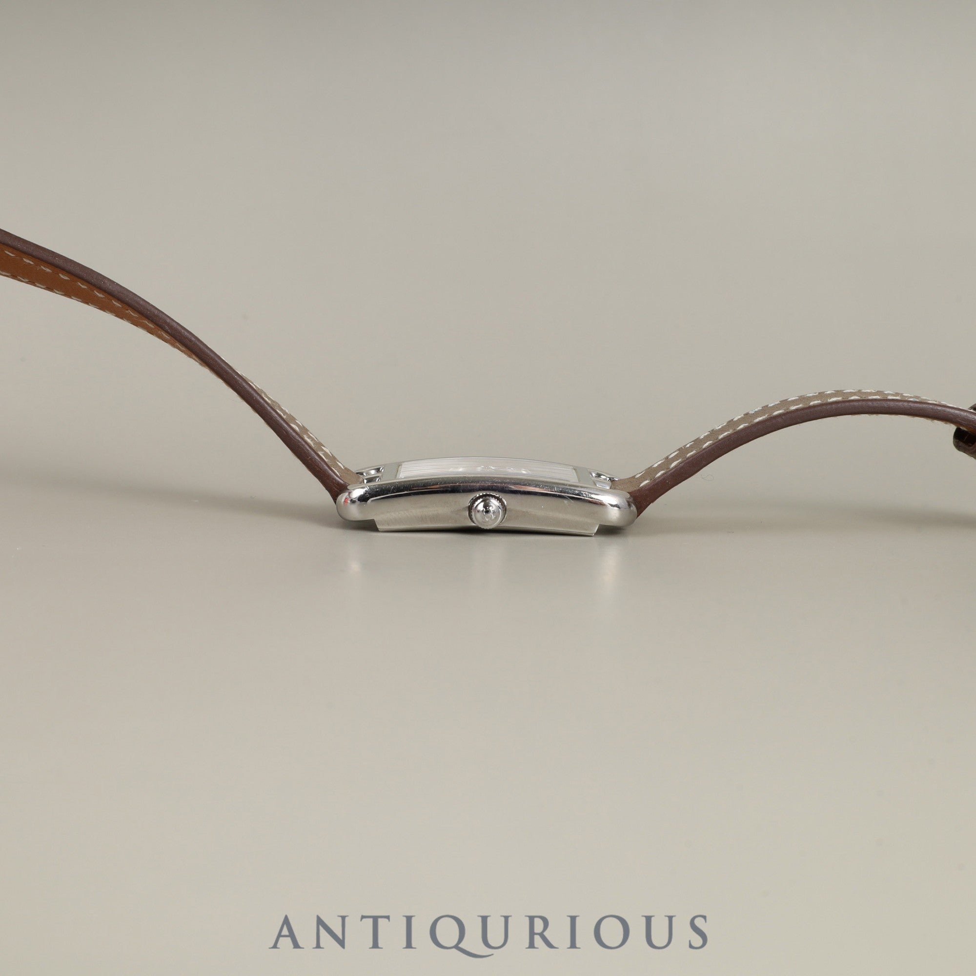 Hermès Nantucket NA2.210 Quartz Cal.280.002 Stainless Steel Watch with Genuine Leather Strap (R Stamp: 2014) and Genuine Stainless Steel Buckle. Silver Dial. Overhauled.