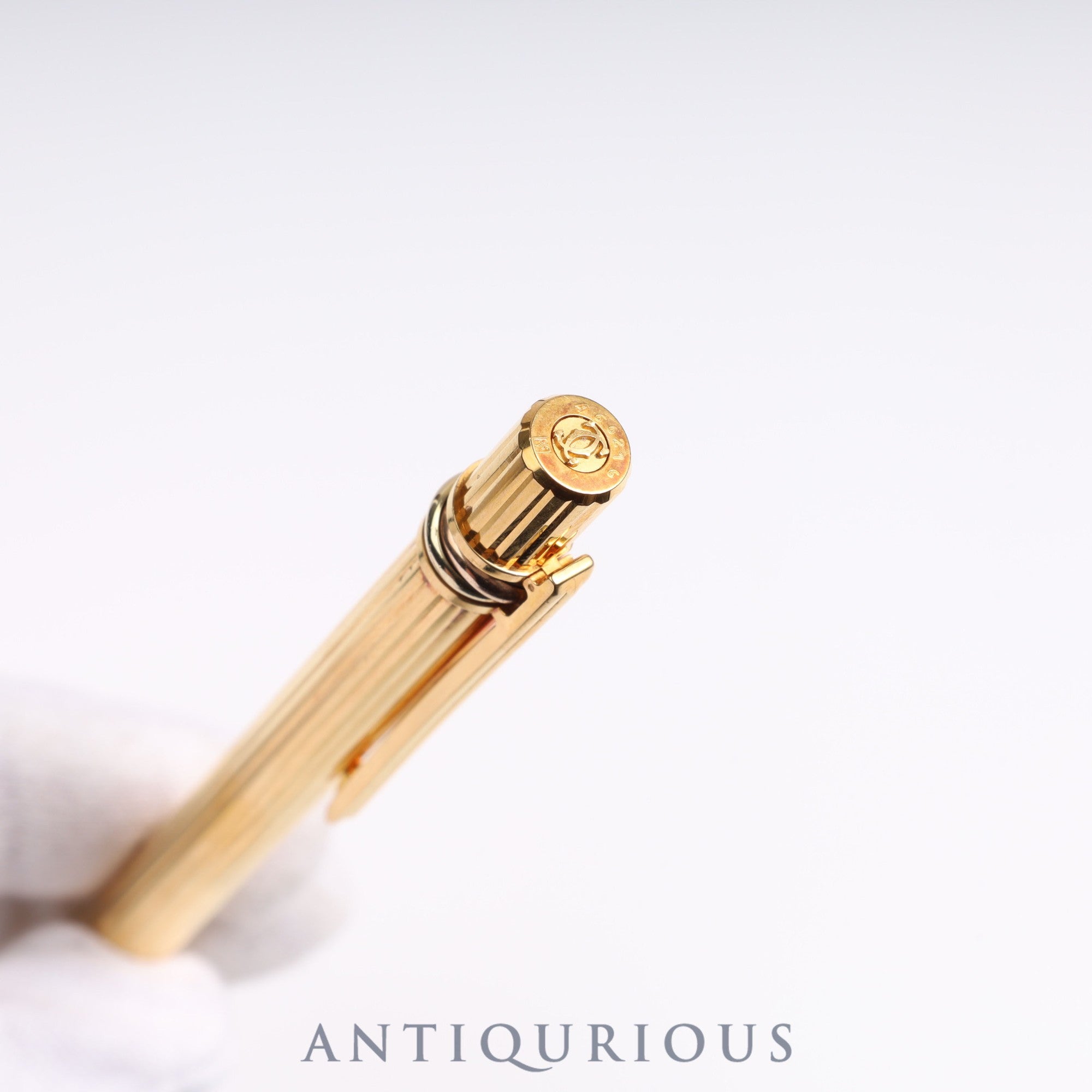 Cartier Trinity ballpoint pen. Replaced with an unused refill at Cartier.