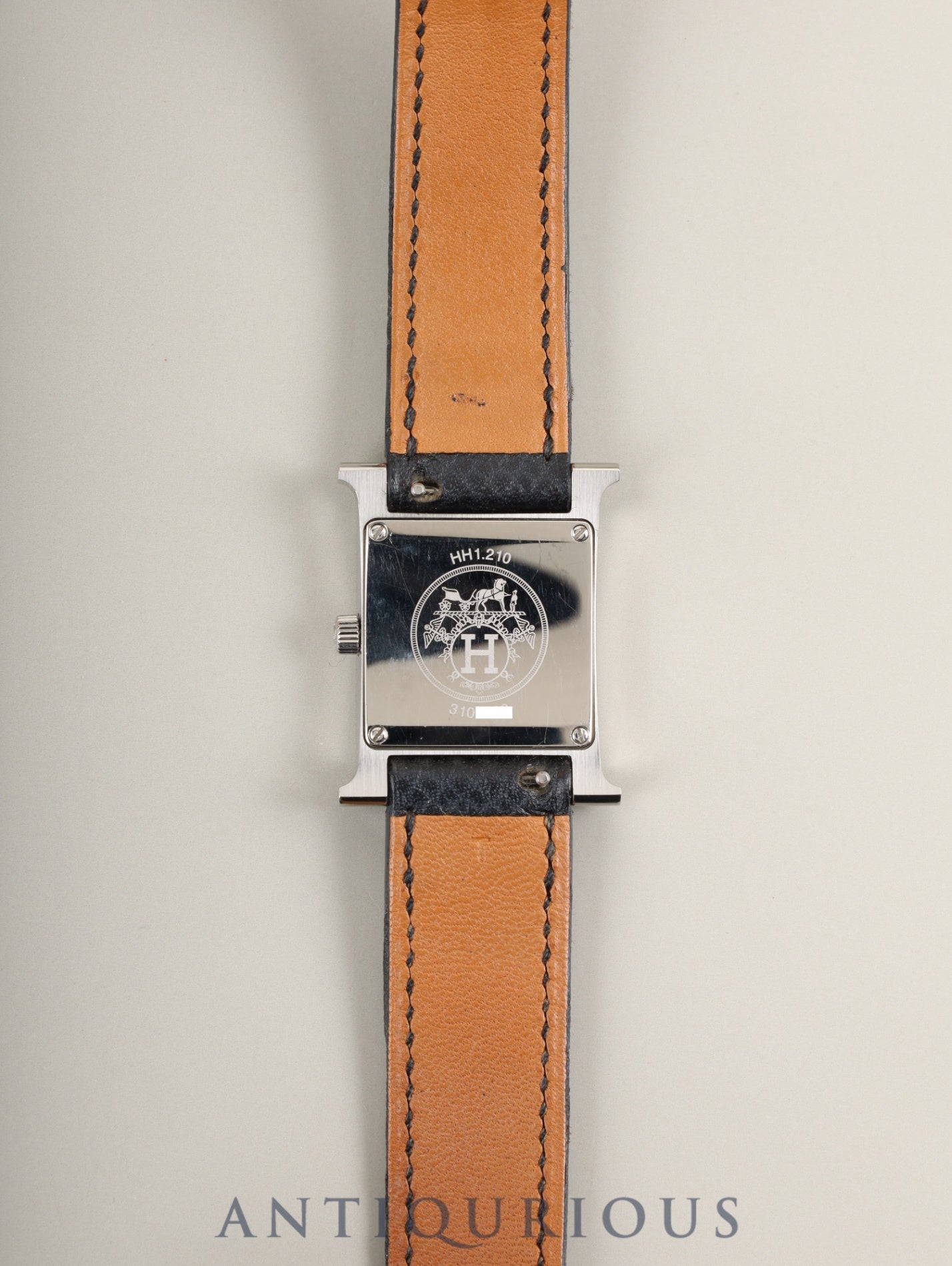 Hermès H Watch Double Tour HH1.210 Quartz Caliber 901.001 Stainless Steel with Genuine Leather Strap (T Stamp: 2015) and Genuine Buckle (SS). White Dial. Includes Box, Warranty Card, and Booklet. Overhauled.