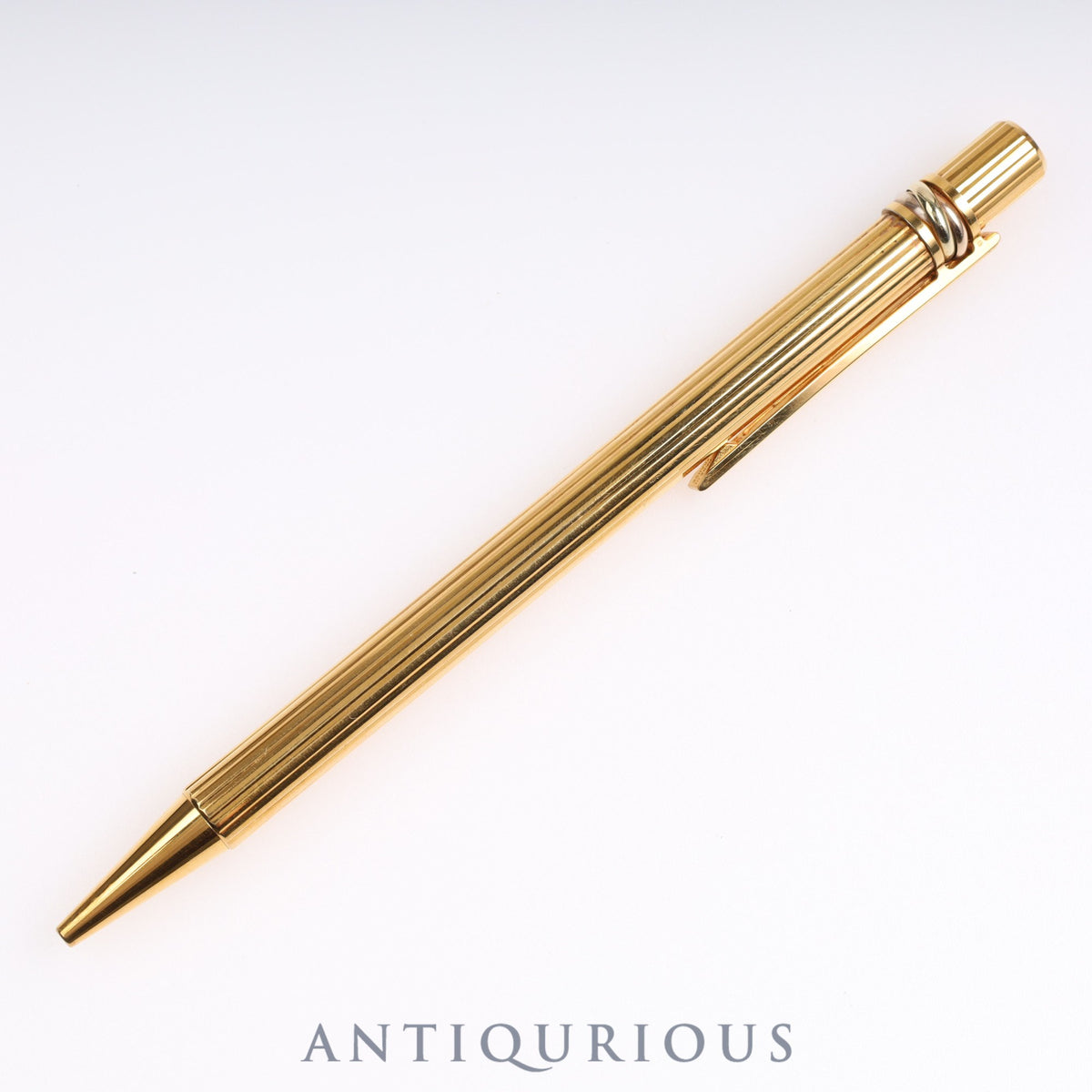 Cartier Trinity ballpoint pen. Replaced with an unused refill at Cartier.