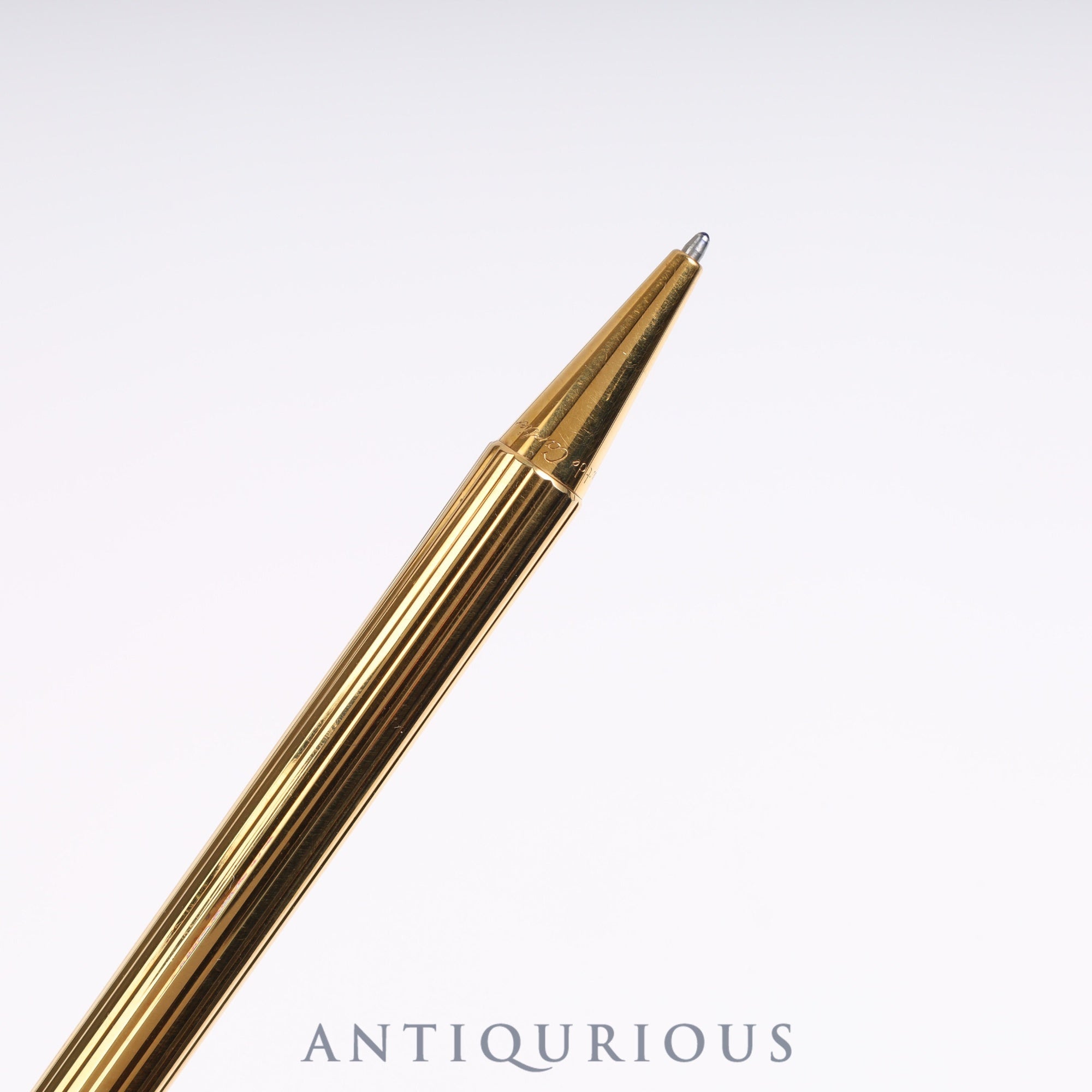 Cartier Trinity ballpoint pen. Replaced with an unused refill at Cartier.