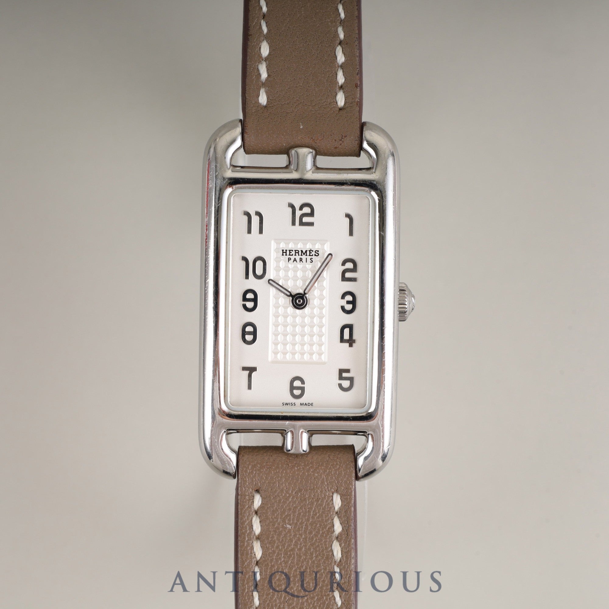 Hermès Nantucket NA2.210 Quartz Cal.280.002 Stainless Steel Watch with Genuine Leather Strap (R Stamp: 2014) and Genuine Stainless Steel Buckle. Silver Dial. Overhauled.