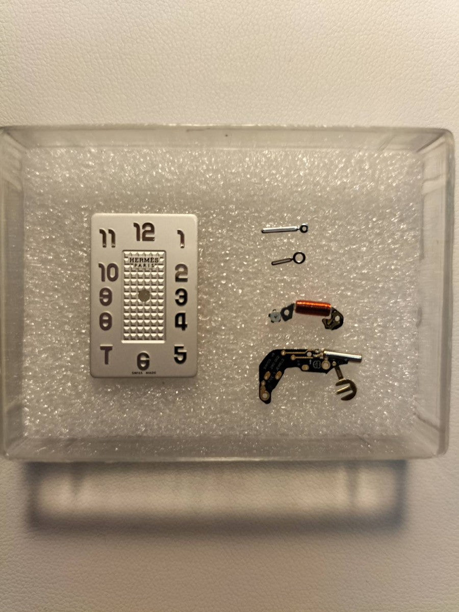 Hermès Nantucket NA2.210 Quartz Cal.280.002 Stainless Steel Watch with Genuine Leather Strap (R Stamp: 2014) and Genuine Stainless Steel Buckle. Silver Dial. Overhauled.