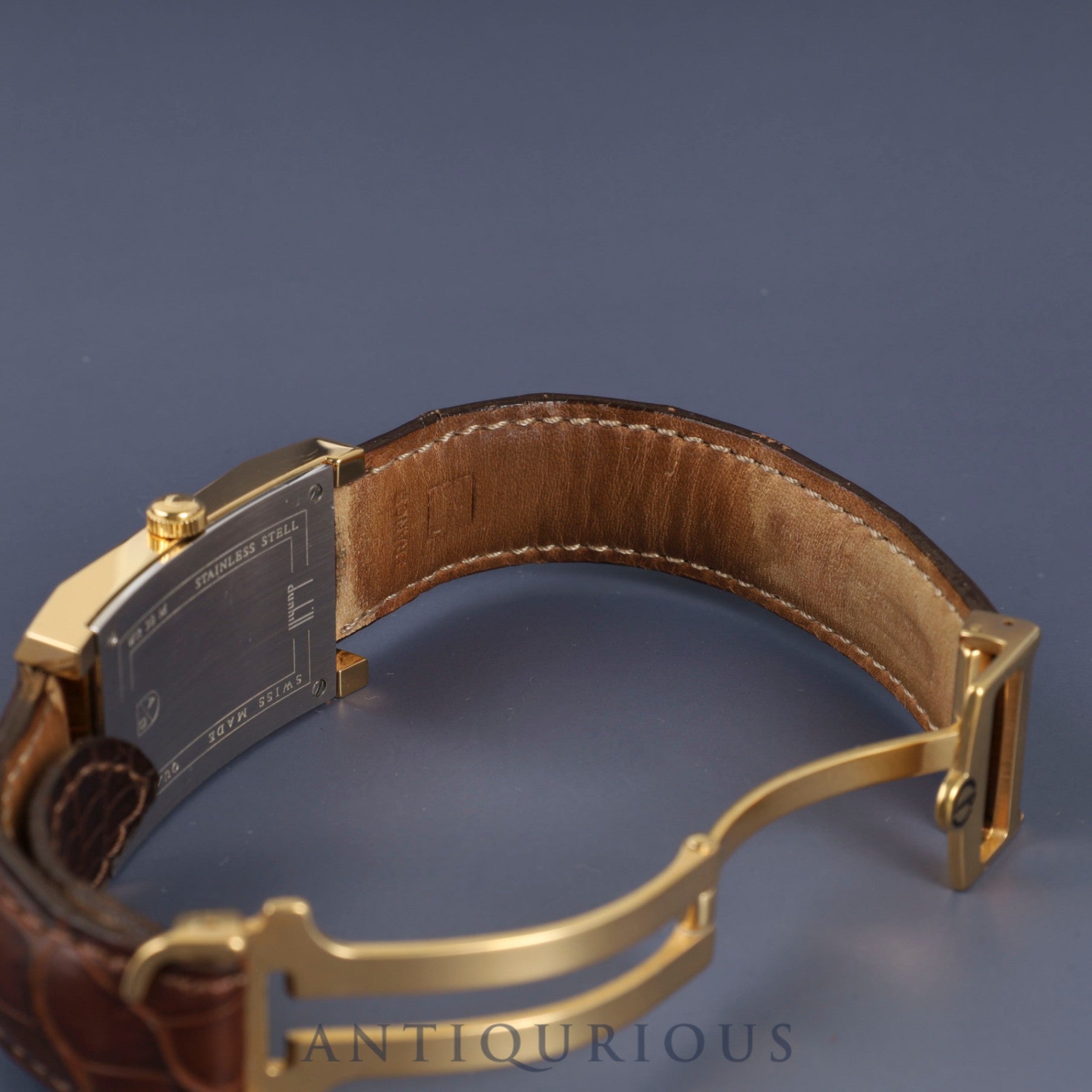 Dunhill Dunhillion Quartz GP with genuine leather strap and genuine D-buckle (GP), white dial, box and booklet, overhauled.