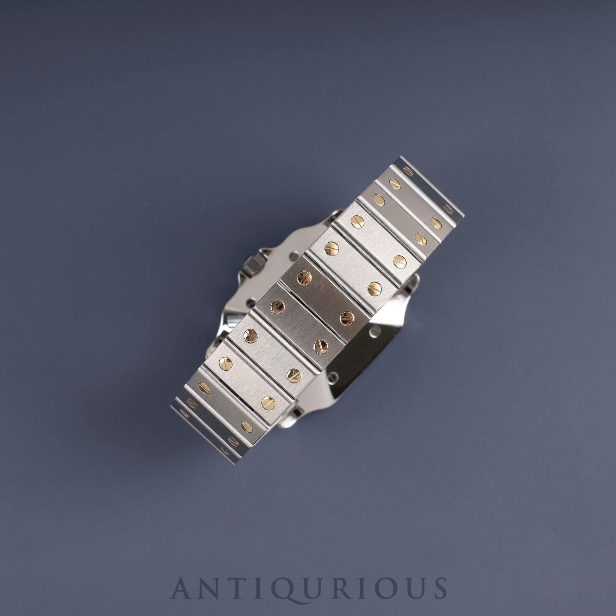 Cartier Santos Galbee LM 1553 Automatic Caliber - Stainless Steel/Yellow Gold with White Dial. Completely serviced at a Cartier boutique. New bracelet replaced.