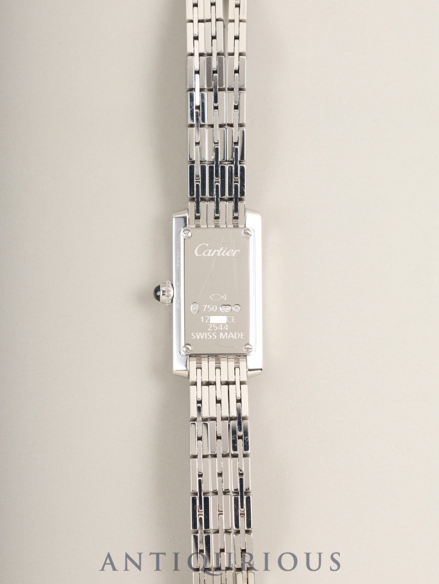カルティエ タンク アロンジェ ラニエ ール SM W15364W3 / 2544 クォーツ Cal280.002(ETA)750WG 750WG シルバー格子ギョーシェ文字盤(SWISS MADE表記)箱 冊子 保証書(2003年 / 個人名記載有)オーバーホール済み