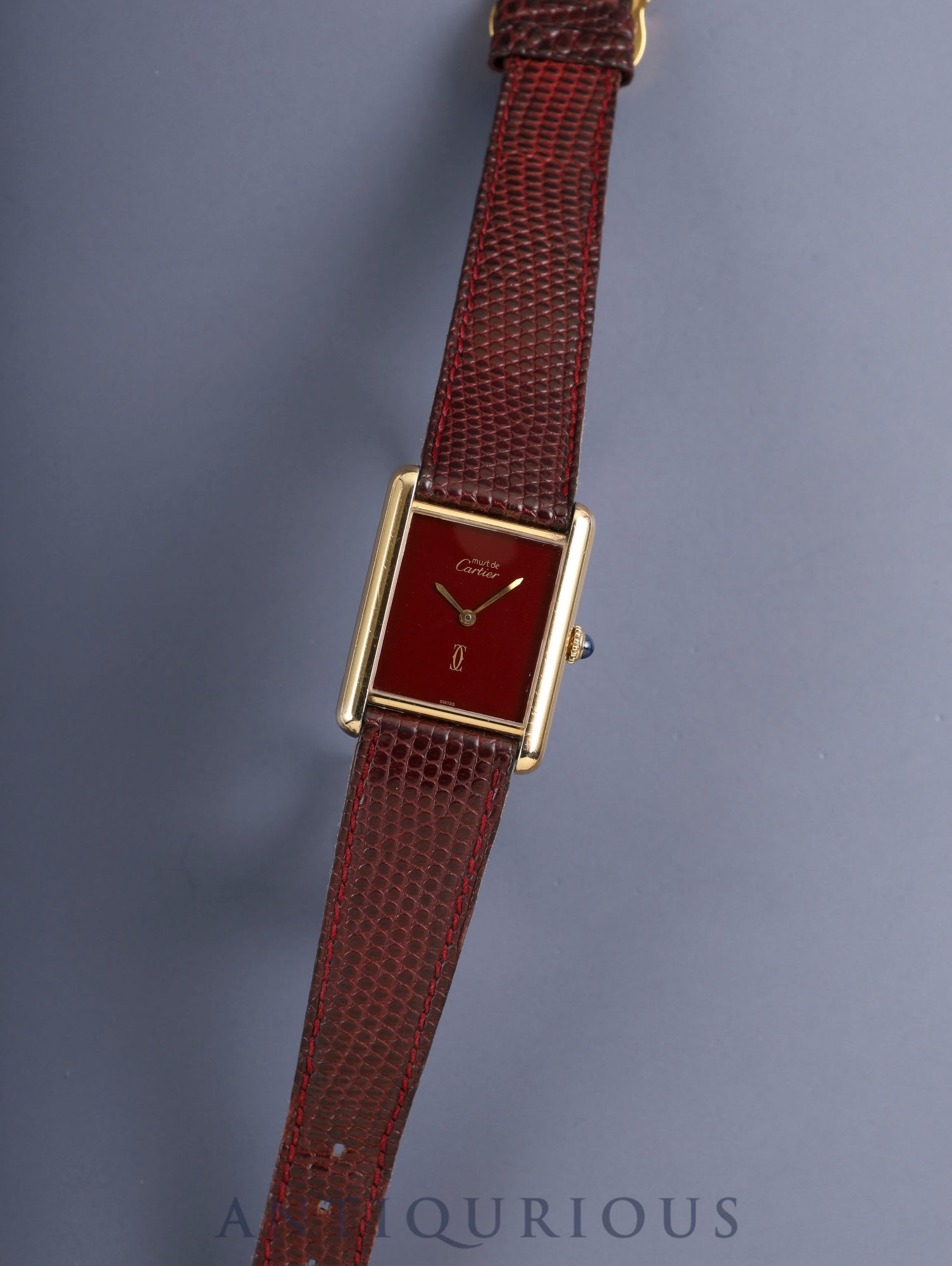 Cartier Must Tank LM, manual winding, Cal. 78-1, SV925, original leather strap, original pin buckle (GP), garnet dial, Bordeaux dial (SWISS marking), recently overhauled.