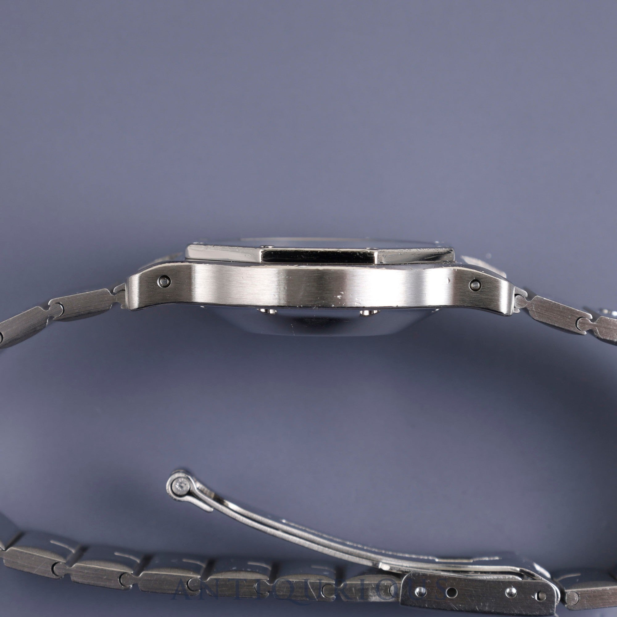Cartier Santos Octagon LM 2965 Automatic SS SS White Roman dial Box Warranty (no date) Complete service (full maintenance) completed at Cartier boutique