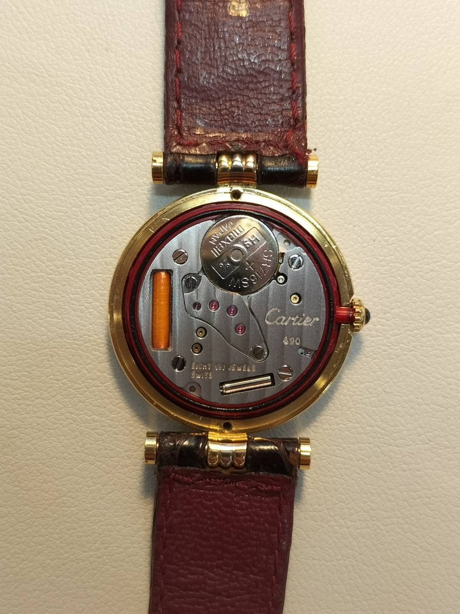Cartier Vendôme Trinity VLC SM 81004 Quartz Caliber 690 750 with genuine leather strap and genuine buckle (GP). White Roman dial with genuine strap. (Unused) Overhauled.