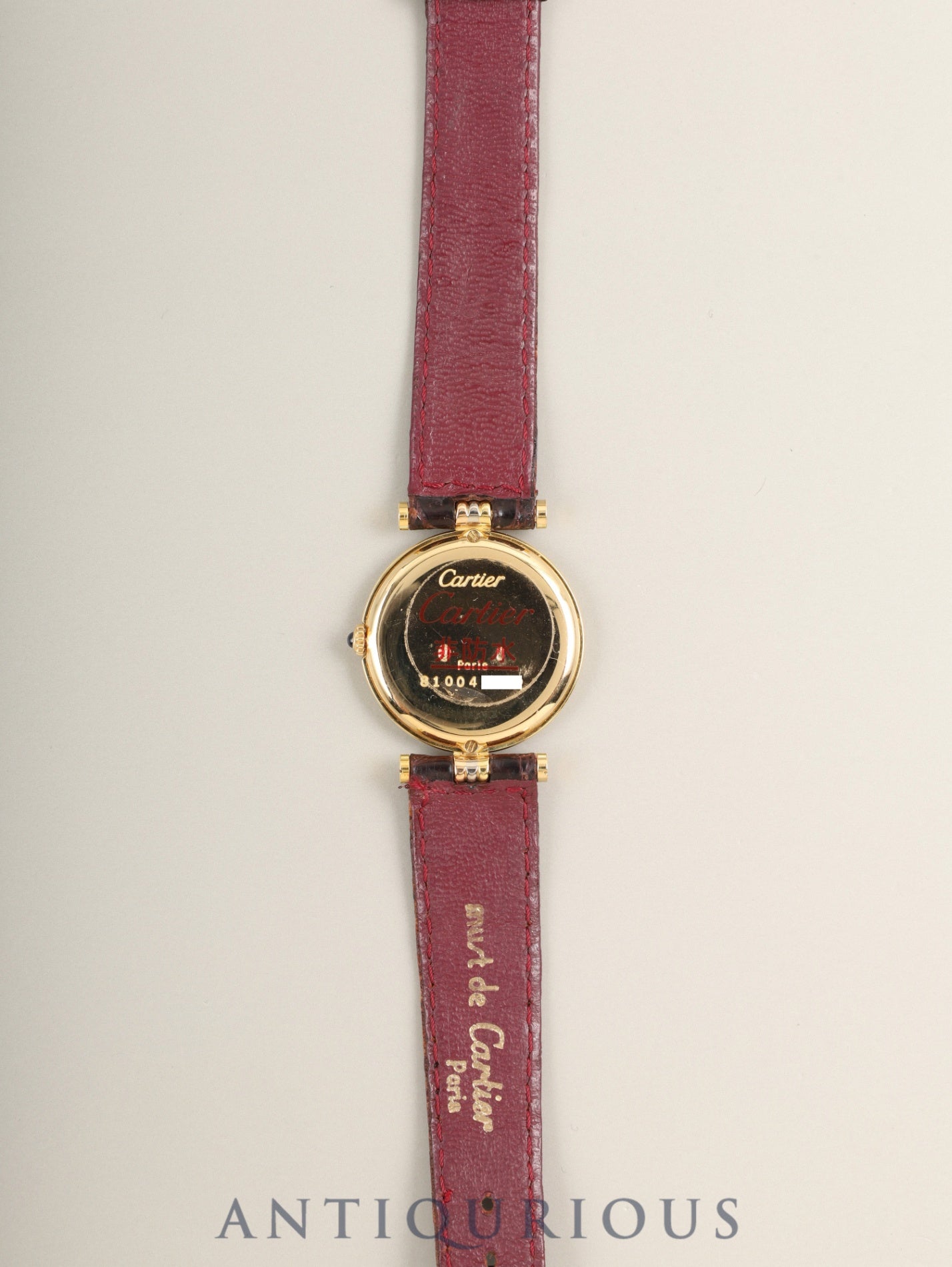 Cartier Vendôme Trinity VLC SM 81004 Quartz Caliber 690 750 with genuine leather strap and genuine buckle (GP). White Roman dial with genuine strap. (Unused) Overhauled.