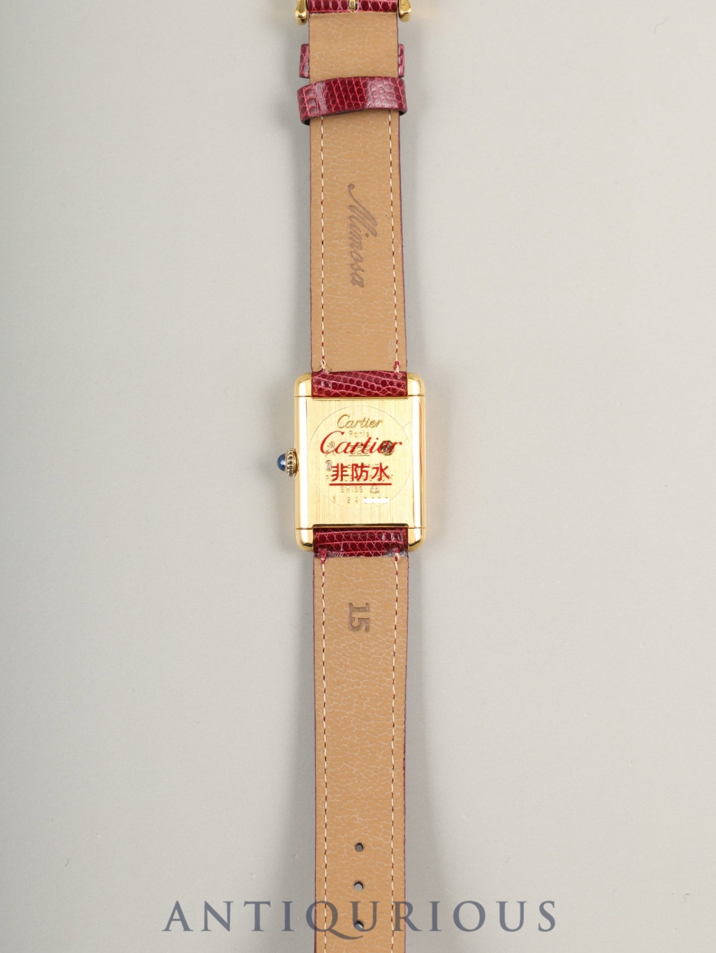 Cartier Must Tank SM, manual winding, SV925, leather, genuine buckle (GP), Bordeaux dial, garnet dial, box, booklet, international lifetime warranty (1984), fully serviced at a Cartier boutique