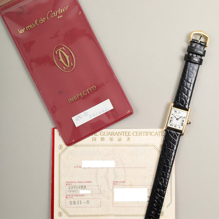 カルティエ タンクルイカルティエ SM 78087 手巻き Cal.ETA2512 750YG 革 純正ピンバックル（GP）ホワイトローマン文字盤（SWISS表記 ）保証書（1984年 /個人名記載あり）冊子 オーバーホール済み