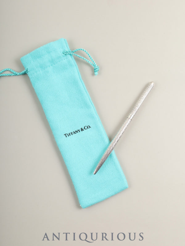 Tiffany ballpoint pen, sterling silver, twist style, made in Germany, wave carving, dust bag. *New non-original ink (black) has been replaced.