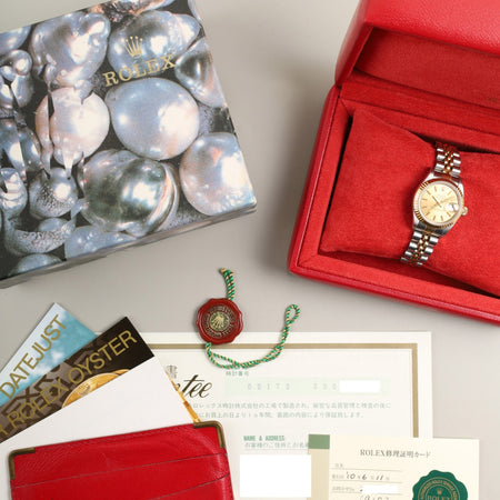ロレックス デイトジャスト レディ 69173 自動巻き Cal.2135 SS/YG SS/YG シャンパン文字盤 S番（1993年）箱 保証書（1995年 / 個人名記載） カードホルダー 冊子 タグ オーバーホール済み
