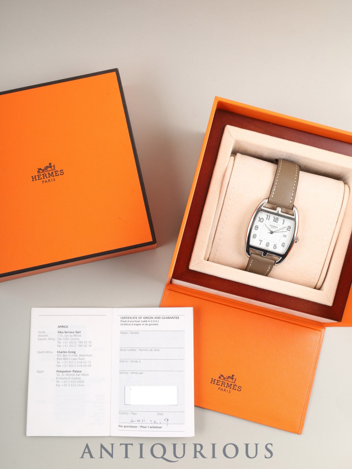 Hermès Cape Cod Tonneau CT1.710 Quartz Stainless Steel Watch with Genuine Leather Strap (R Stamp: 2014) and Genuine Buckle (SS). White Dial, Box, Warranty Card (2011) Overhauled.