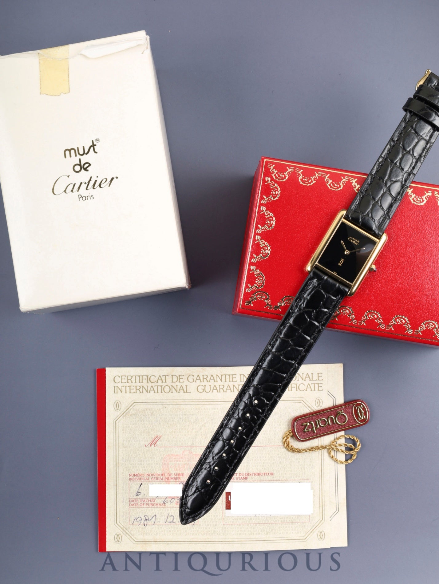 Cartier クォーツ時計 バーガンディ レザー COLLECTIONS | 東京銀座のヴィンテージウォッチ専門店 - ANTIQURIOUS