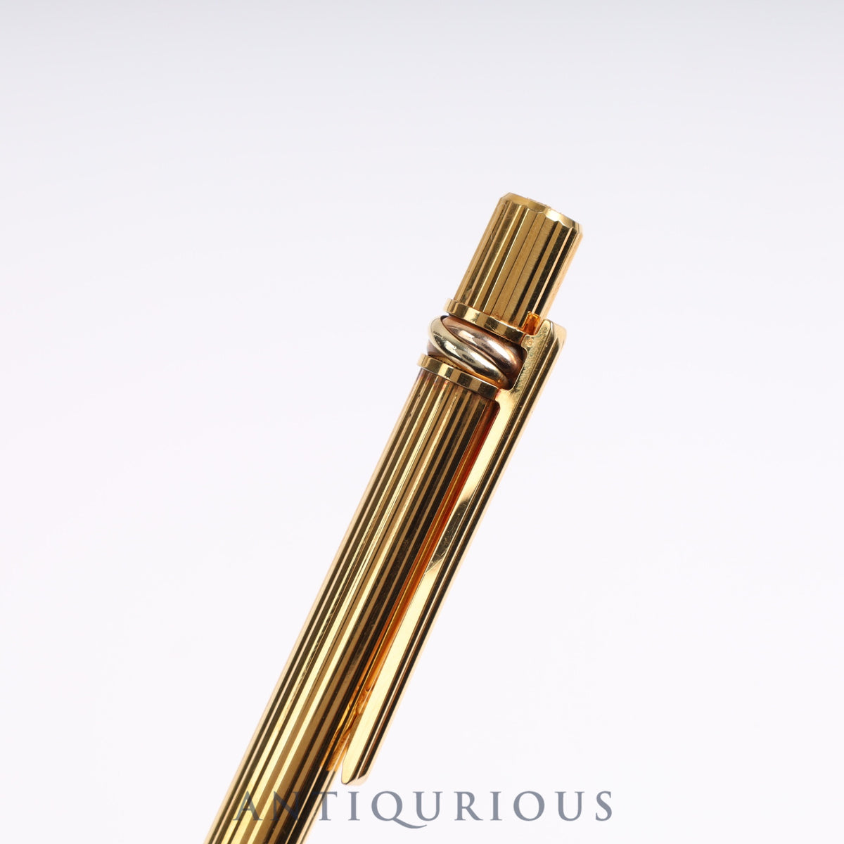 Cartier Trinity ballpoint pen. Replaced with an unused refill at Cartier.