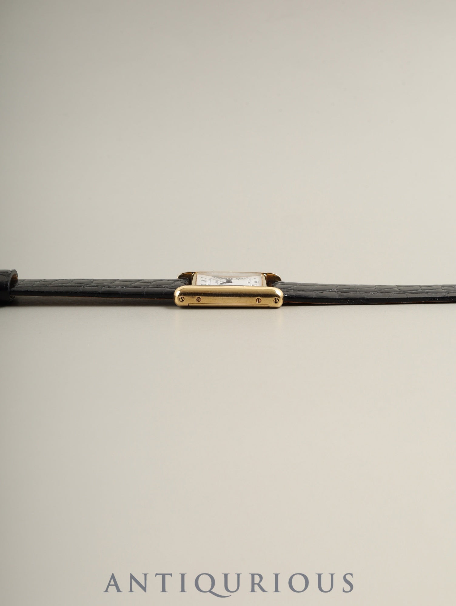 カルティエ タンクルイカルティエ SM 78087 手巻き Cal.ETA2512 750YG 革 純正ピンバックル（GP）ホワイトローマン文字盤（SWISS表記 ）保証書（1984年 /個人名記載あり）冊子 オーバーホール済み