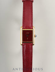 Cartier Must Tank SM, manual winding, SV925, leather, genuine buckle (GP), Bordeaux dial, garnet dial, box, booklet, international lifetime warranty (1984), fully serviced at a Cartier boutique