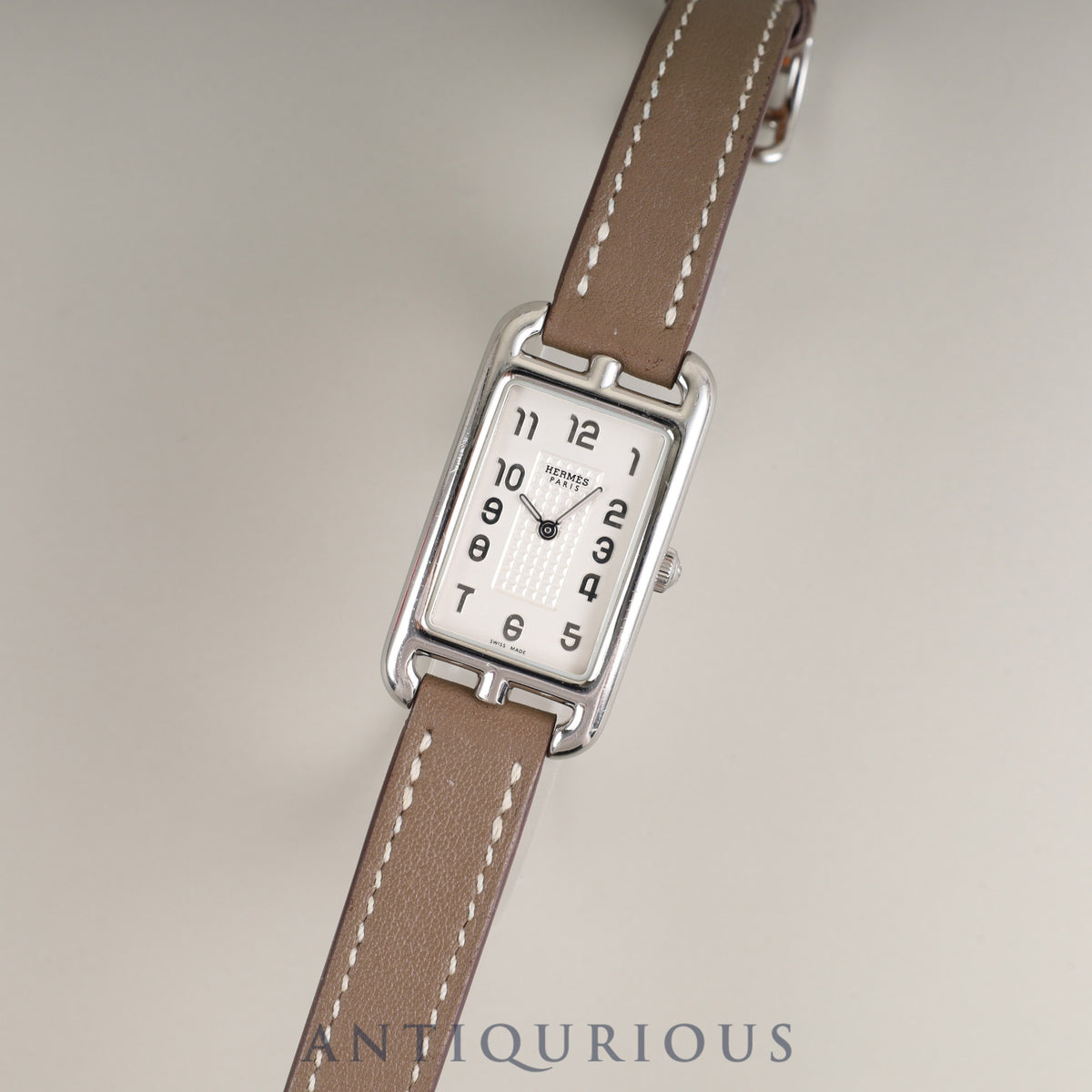 Hermès Nantucket NA2.210 Quartz Cal.280.002 Stainless Steel Watch with Genuine Leather Strap (R Stamp: 2014) and Genuine Pin Buckle (SS). Silver Dial. Overhauled.