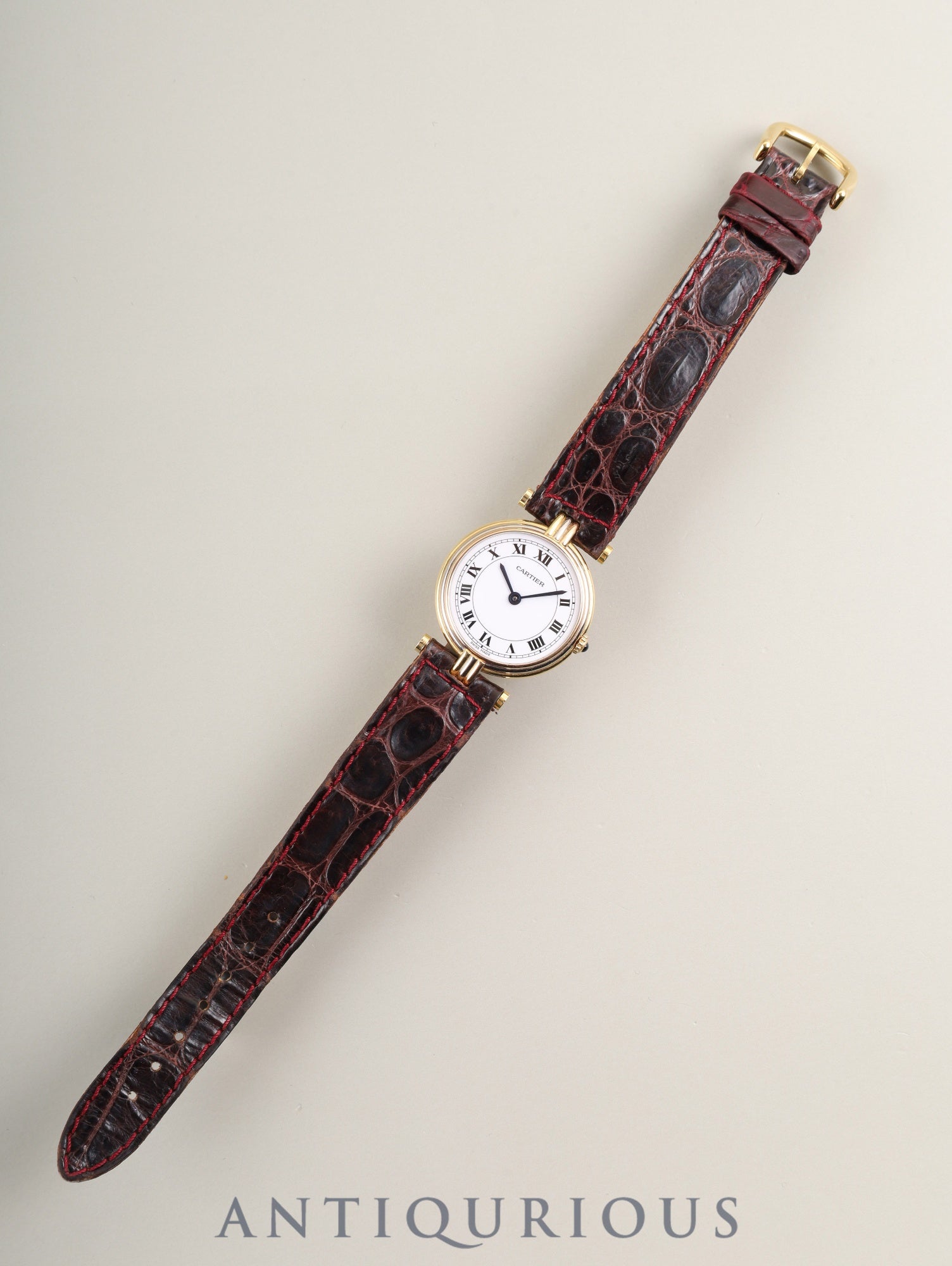 Cartier Vendôme Trinity VLC SM 81004 Quartz Caliber 690 750 with genuine leather strap and genuine buckle (GP). White Roman dial with genuine strap. (Unused) Overhauled.